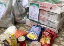  قسم المساعدات الخيرية في مؤسسة كاشف الغطاء العامة يوزع السلات الغذائية على العوائل المتعففة